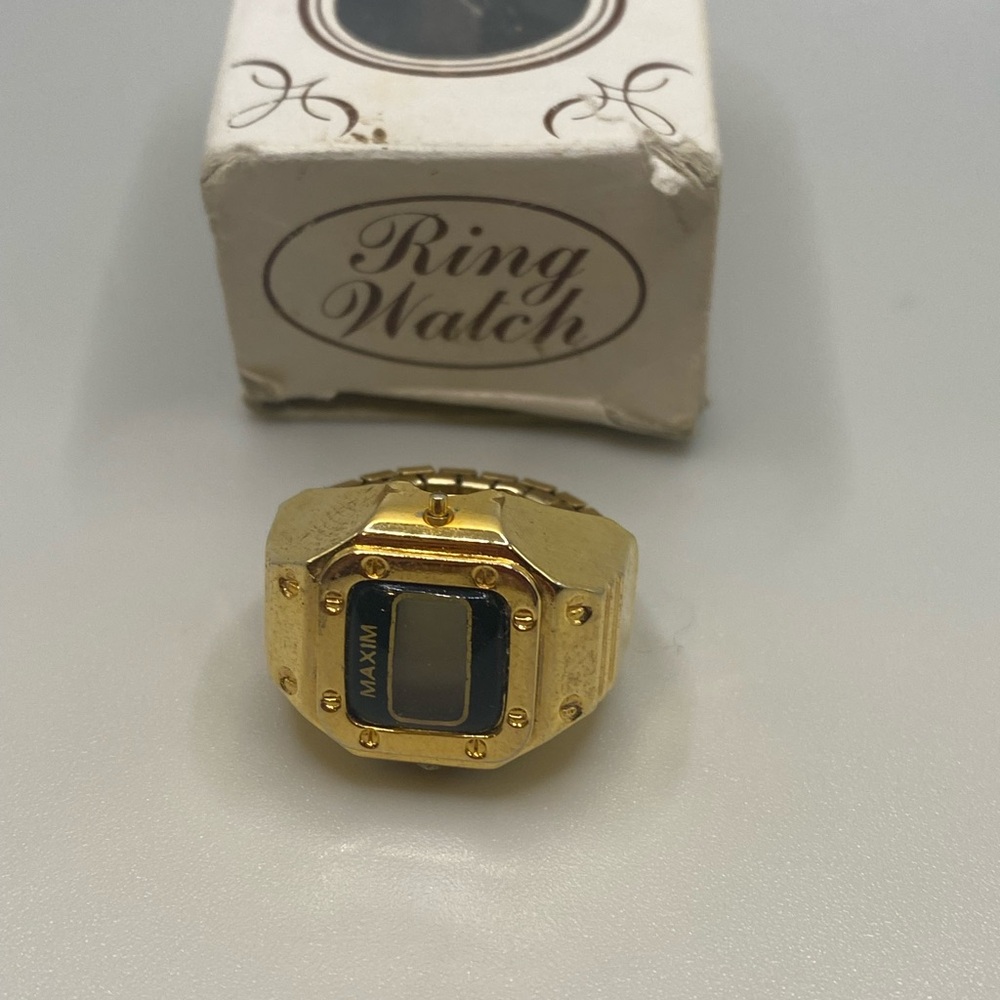 Gold Ring Watch with Black Face